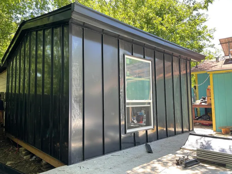 Black standing seam metal wall panels for Metal Roof Installation in Winooski