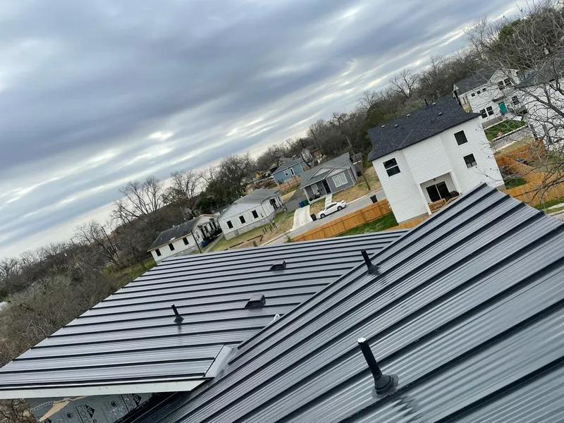 Standing seam metal roof panels with vents for Skylight Repair in Winooski